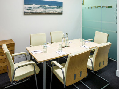 Tidal room with table and chairs
