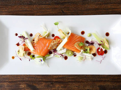 Slow-cooked salt-cured salmon with vegetables and wasabi purée