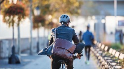 Businessman commuter on an electric bicycle